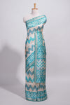 Turquoise color tussar saree body chevron prints floral motifs and printed pallu along with matching blouse