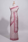 Soft blush pink tussar saree with subtle woven stripes Ikat-inspired border geometric woven pallu with tassels with blouse piece