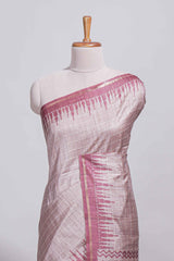 Soft blush pink tussar saree with subtle woven stripes Ikat-inspired border geometric woven pallu with tassels with blouse piece