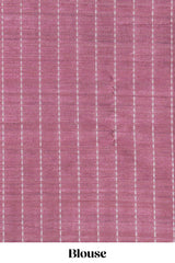 Soft blush pink tussar saree with subtle woven stripes Ikat-inspired border geometric woven pallu with tassels with blouse piece