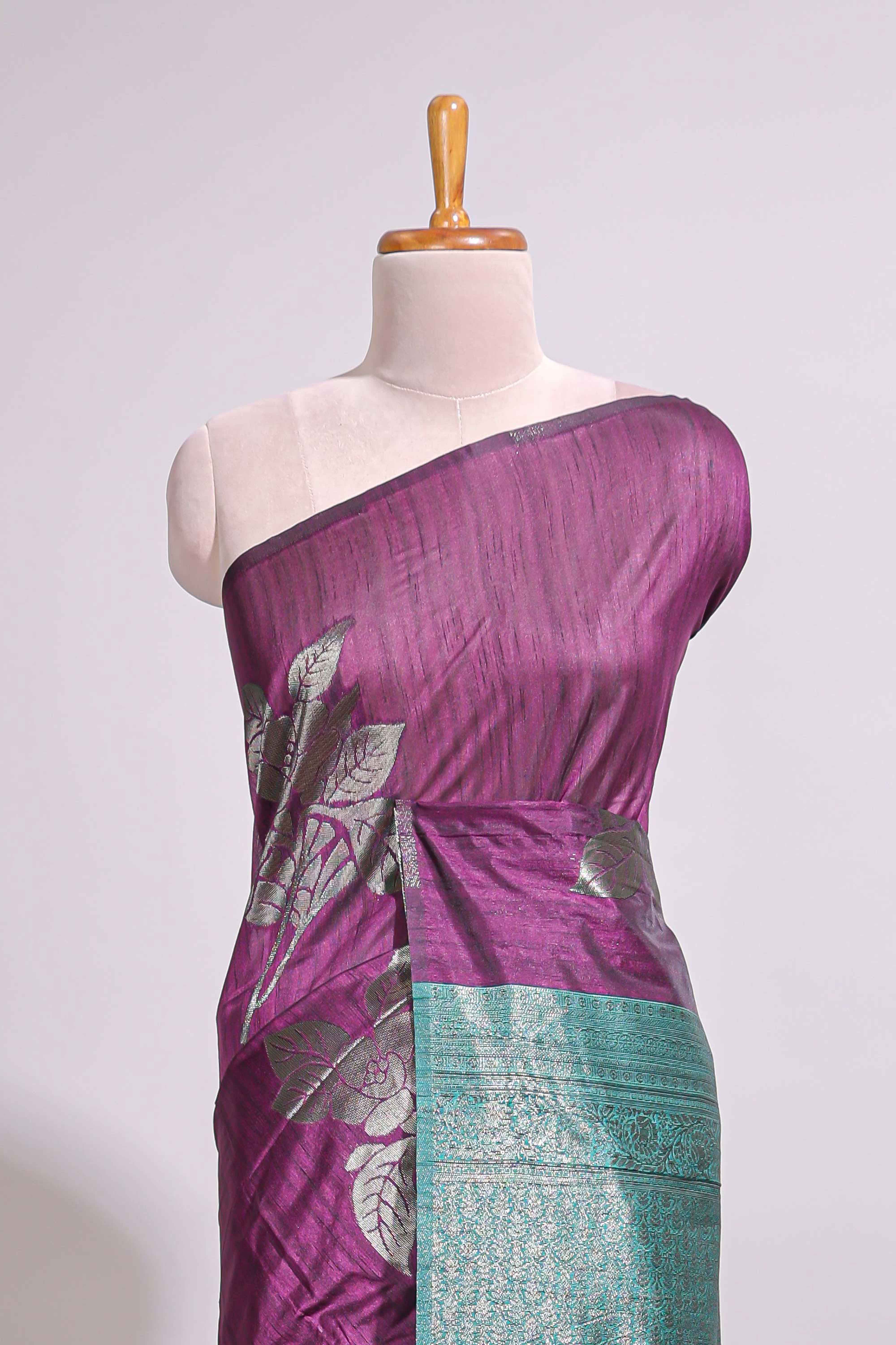 Borderless floral design purple art tussar saree with contrast pallu and silver motifs blouse