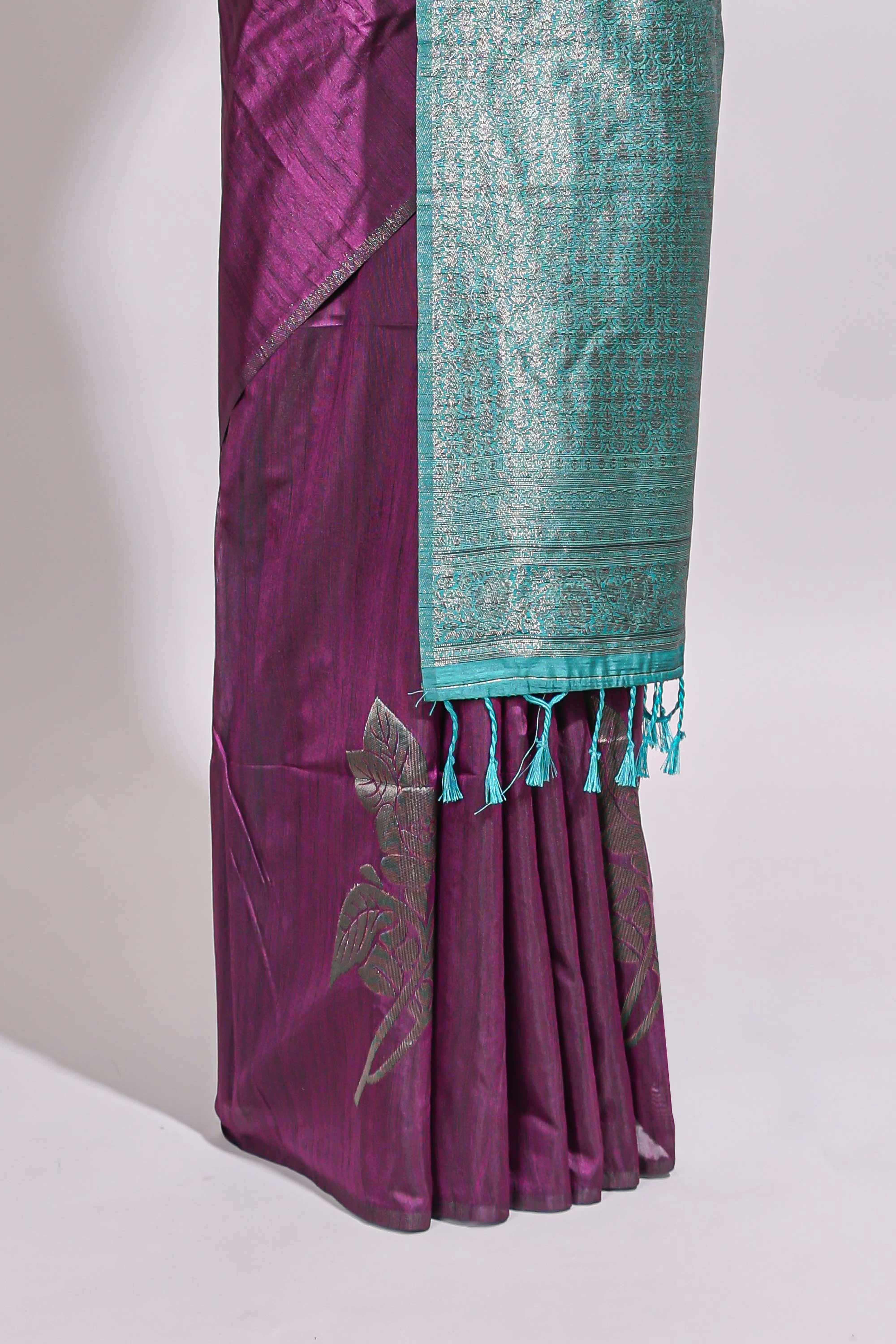 Borderless floral design purple art tussar saree with contrast pallu and silver motifs blouse