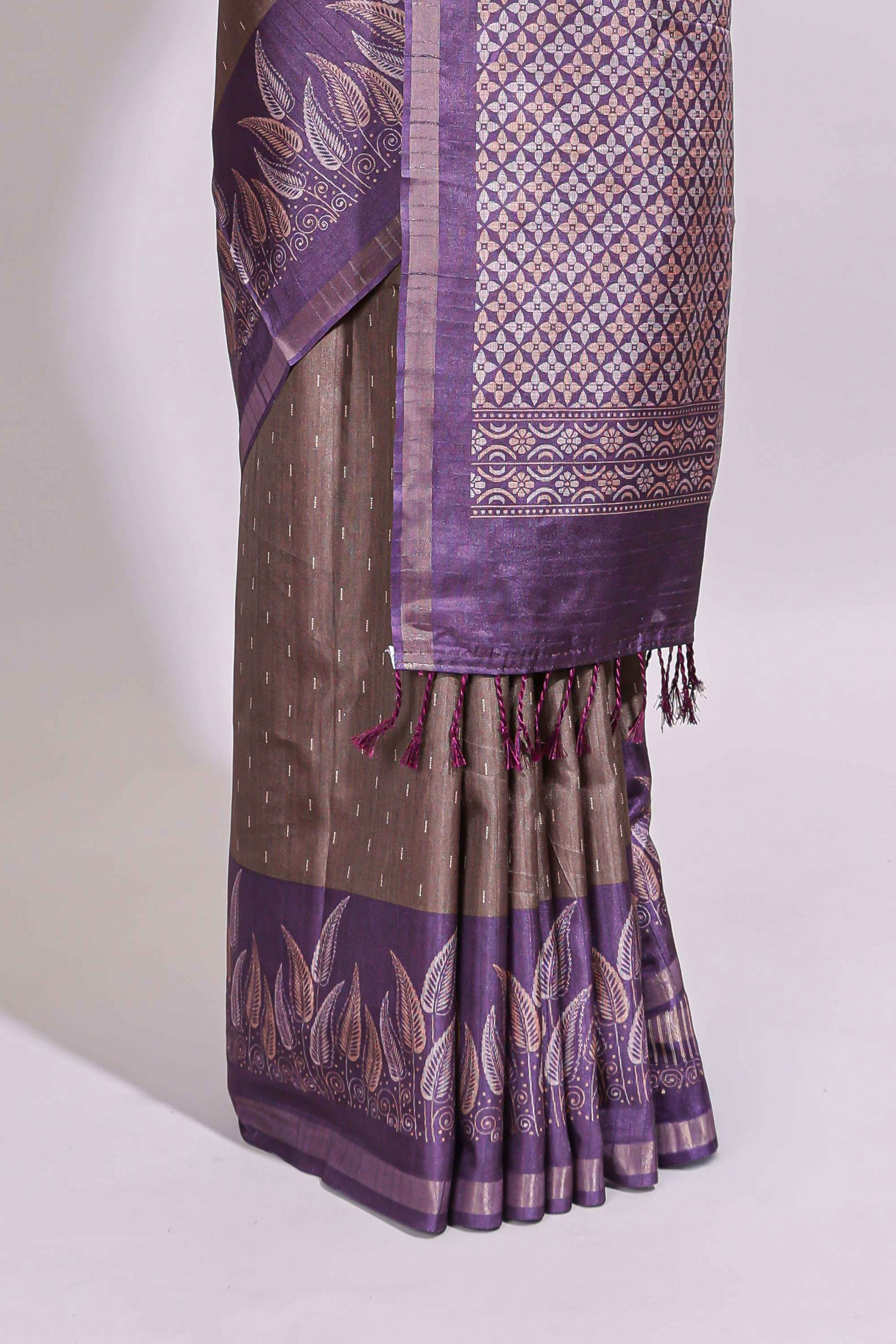 Dark beige geometric motifs art tussar saree with contrast border and striped blouse