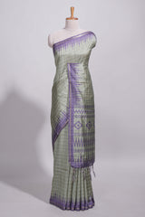 Pastel green Tussar saree with contrast border and contrast printed pallu with matching blouse