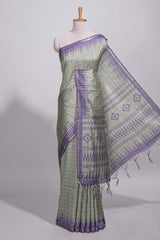 Pastel green Tussar saree with contrast border and contrast printed pallu with matching blouse