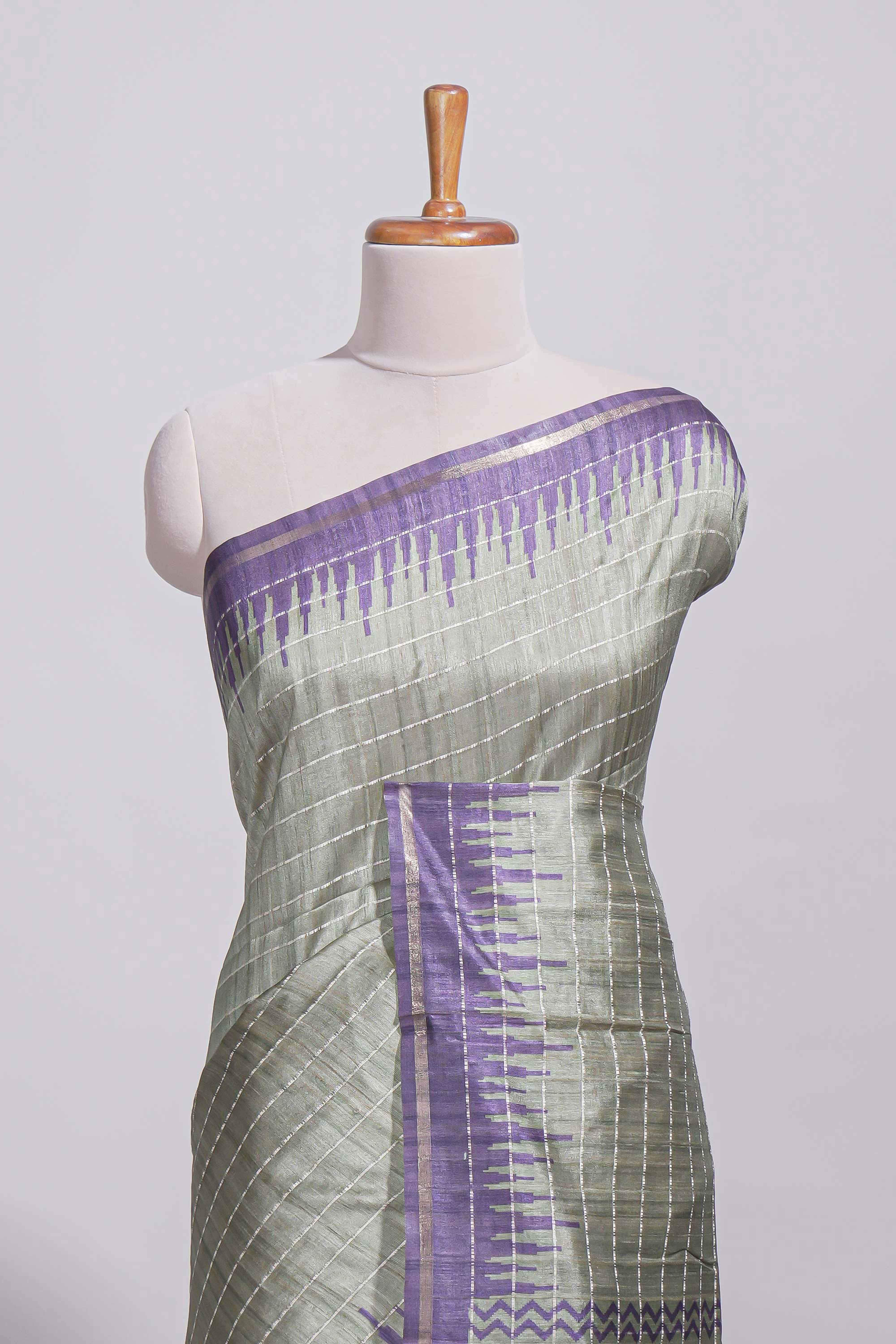 Pastel green Tussar saree with contrast border and contrast printed pallu with matching blouse