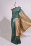Borderless floral design green art tussar saree with contrast pallu and silver motifs blouse
