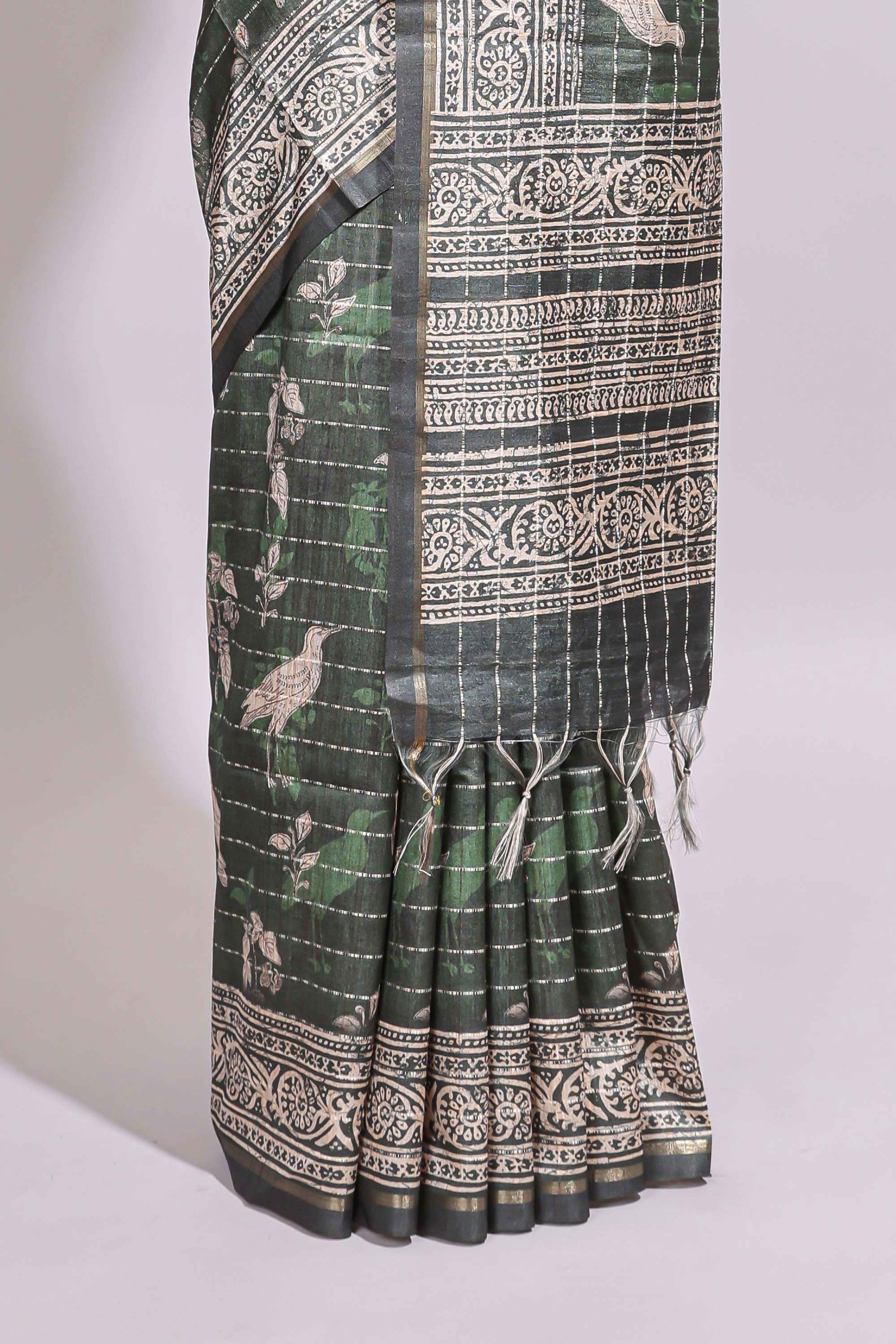Forest green birds and floral design art tusser saree with contrast border and floral motifs blouse