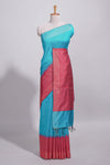 Aqua blue Tussar saree with magenta zari woven border and contrast pallu with matching magenta blouse