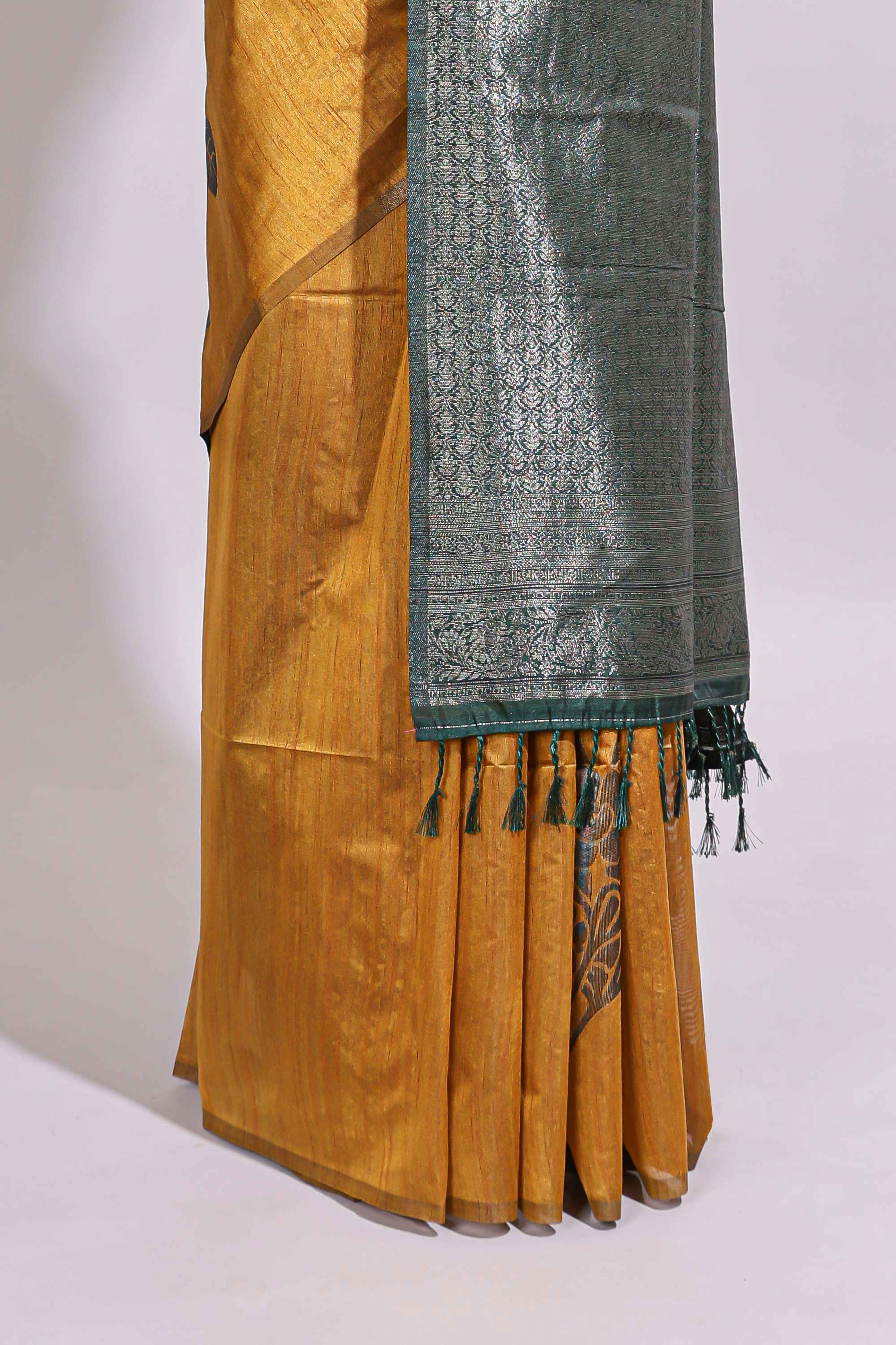 Borderless floral design mustard art tussar saree with contrast pallu and silver motifs blouse