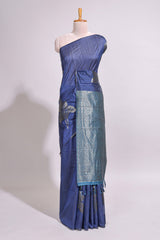 Borderless floral design blue art tussar saree with contrast pallu and silver motifs blouse