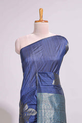 Borderless floral design blue art tussar saree with contrast pallu and silver motifs blouse