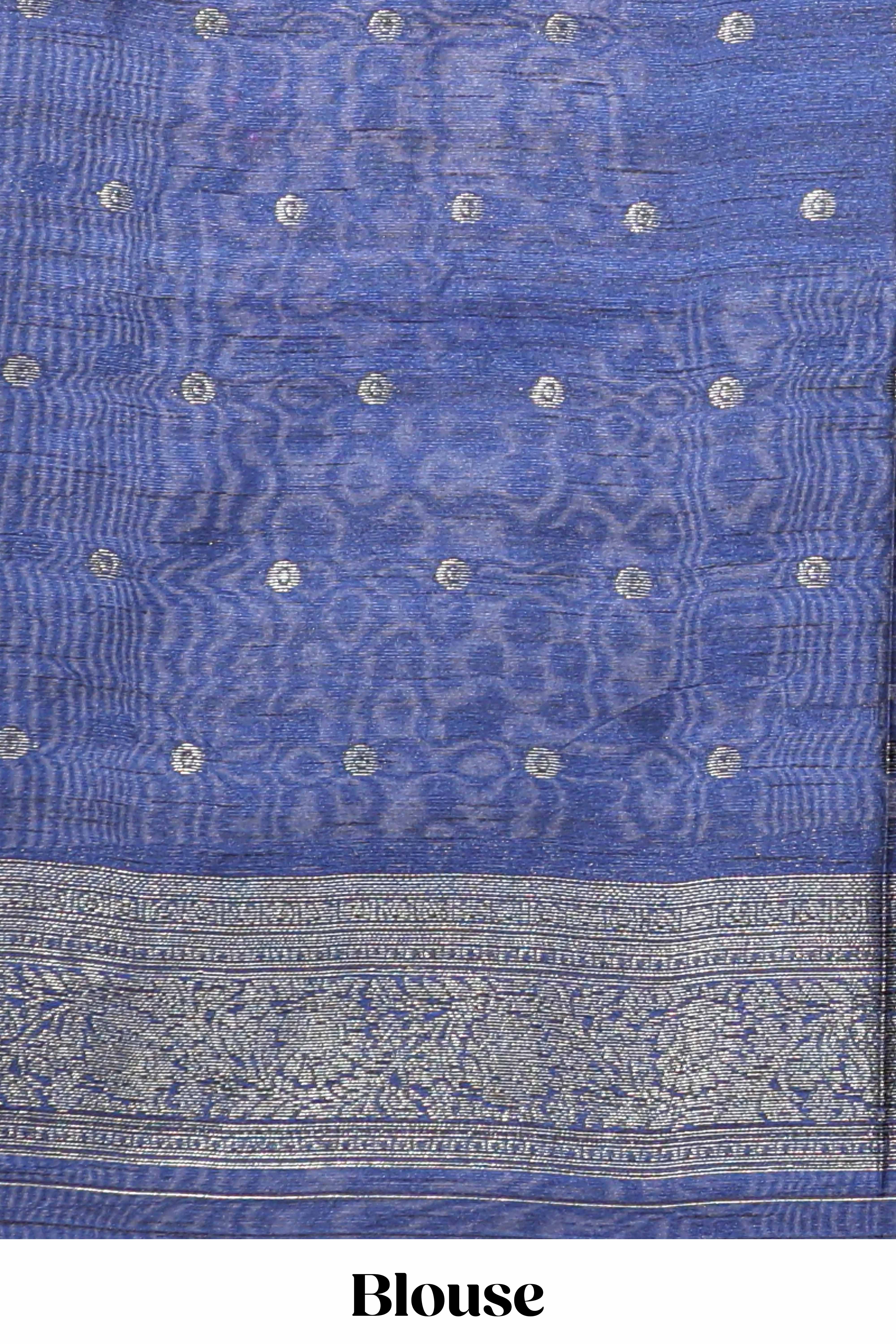 Borderless floral design green art tussar saree with contrast pallu and silver motifs blouse