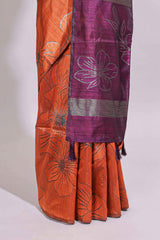 Borderless orange floral design art tusser saree with contrast pallu and floral motifs blouse