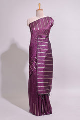 Purple zari butta art tusser saree with self border and striped blouse