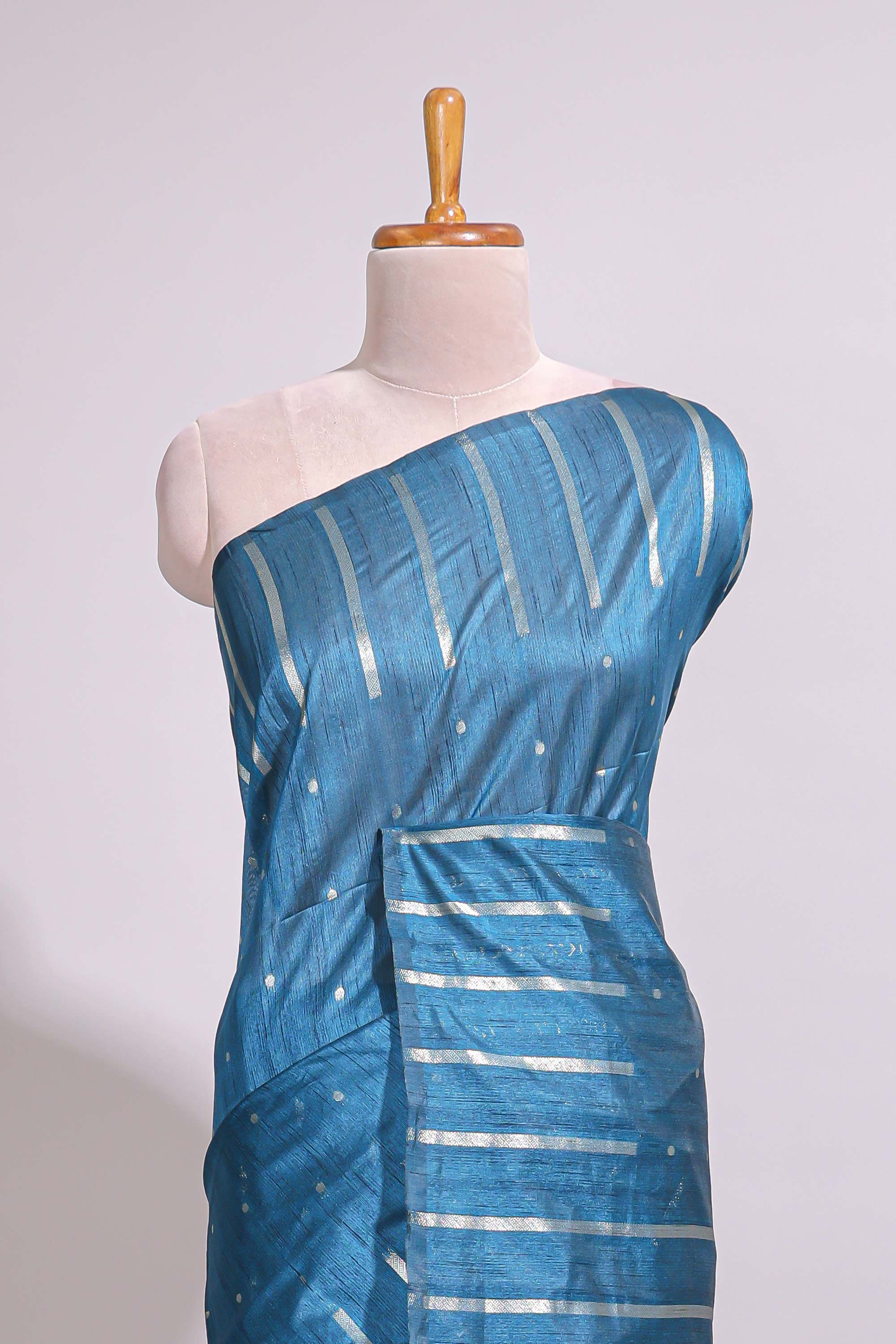 Blue zari butta art tusser saree with self border and striped blouse