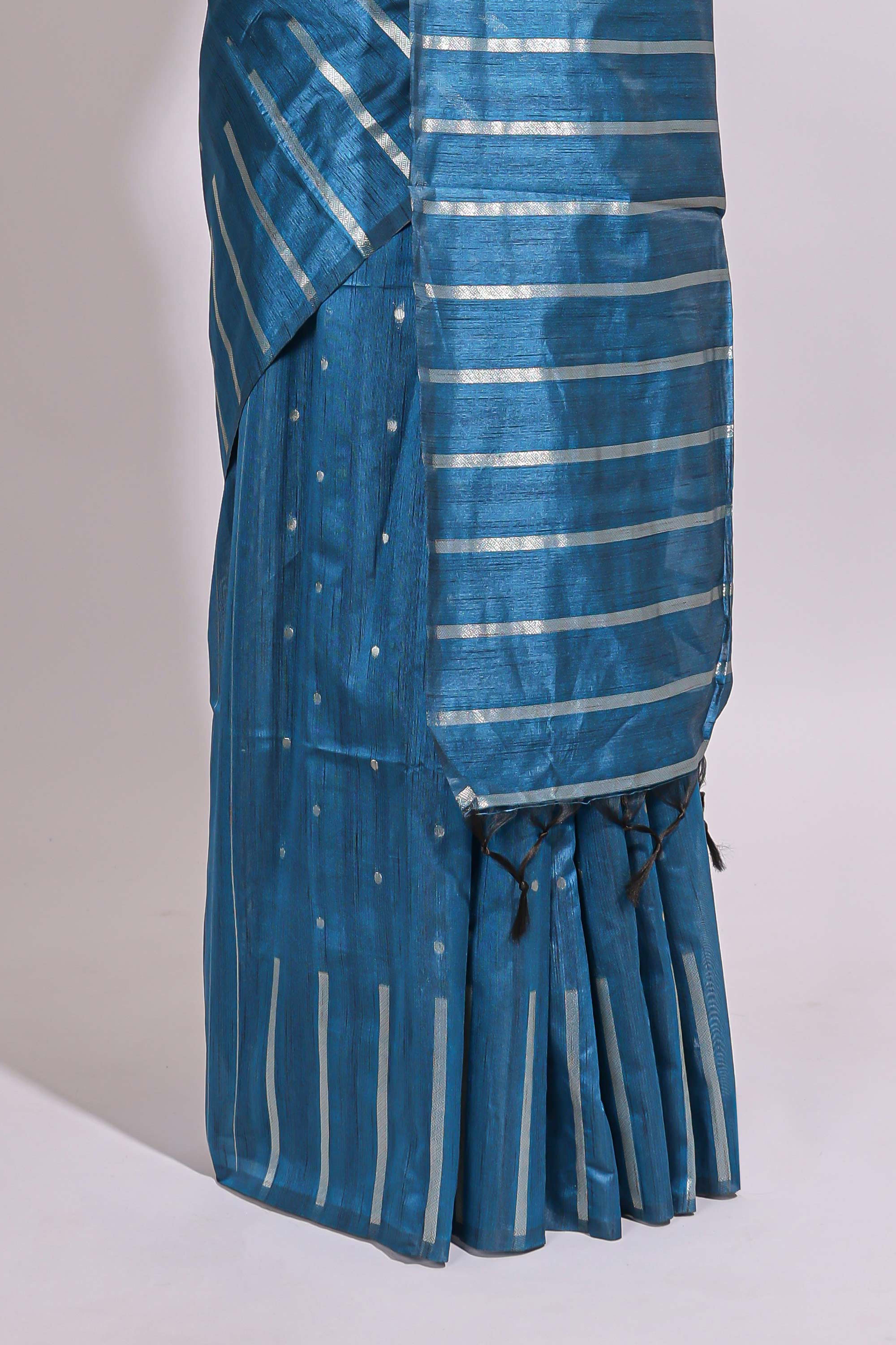 Blue zari butta art tusser saree with self border and striped blouse