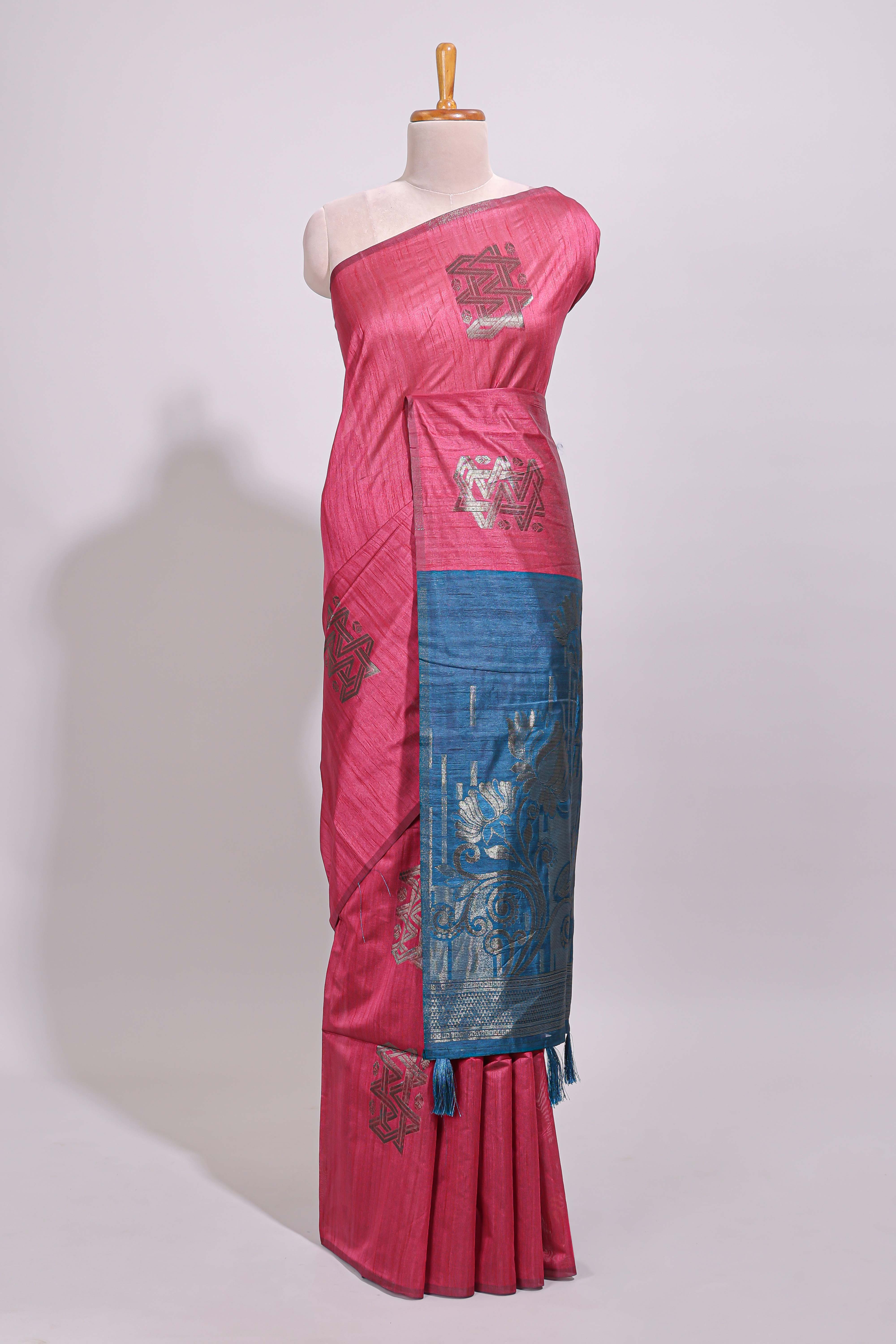 Borderless pink textured zari motifs art tussar saree with contrast floral design pallu and zari motifs blouse