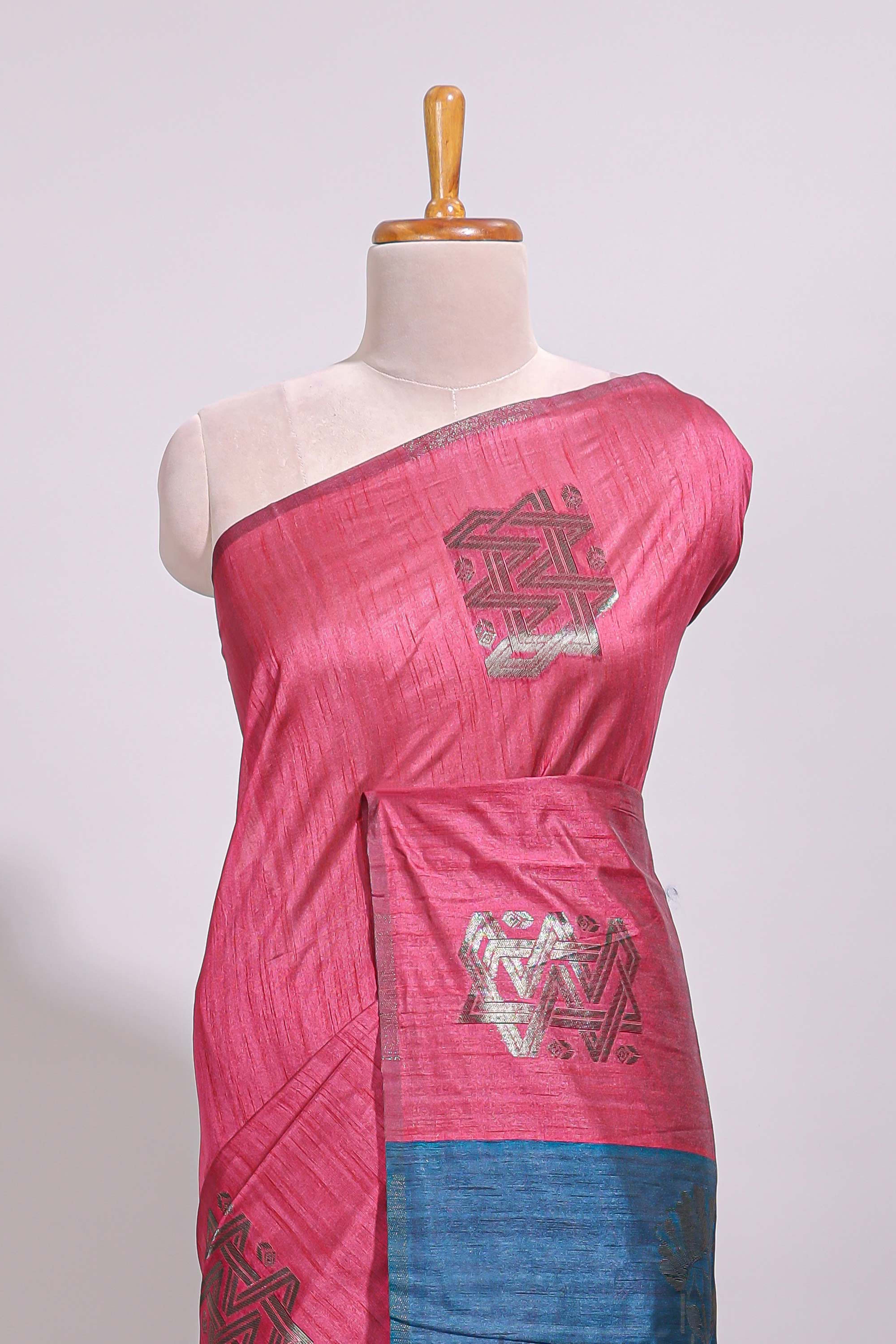 Borderless pink textured zari motifs art tussar saree with contrast floral design pallu and zari motifs blouse