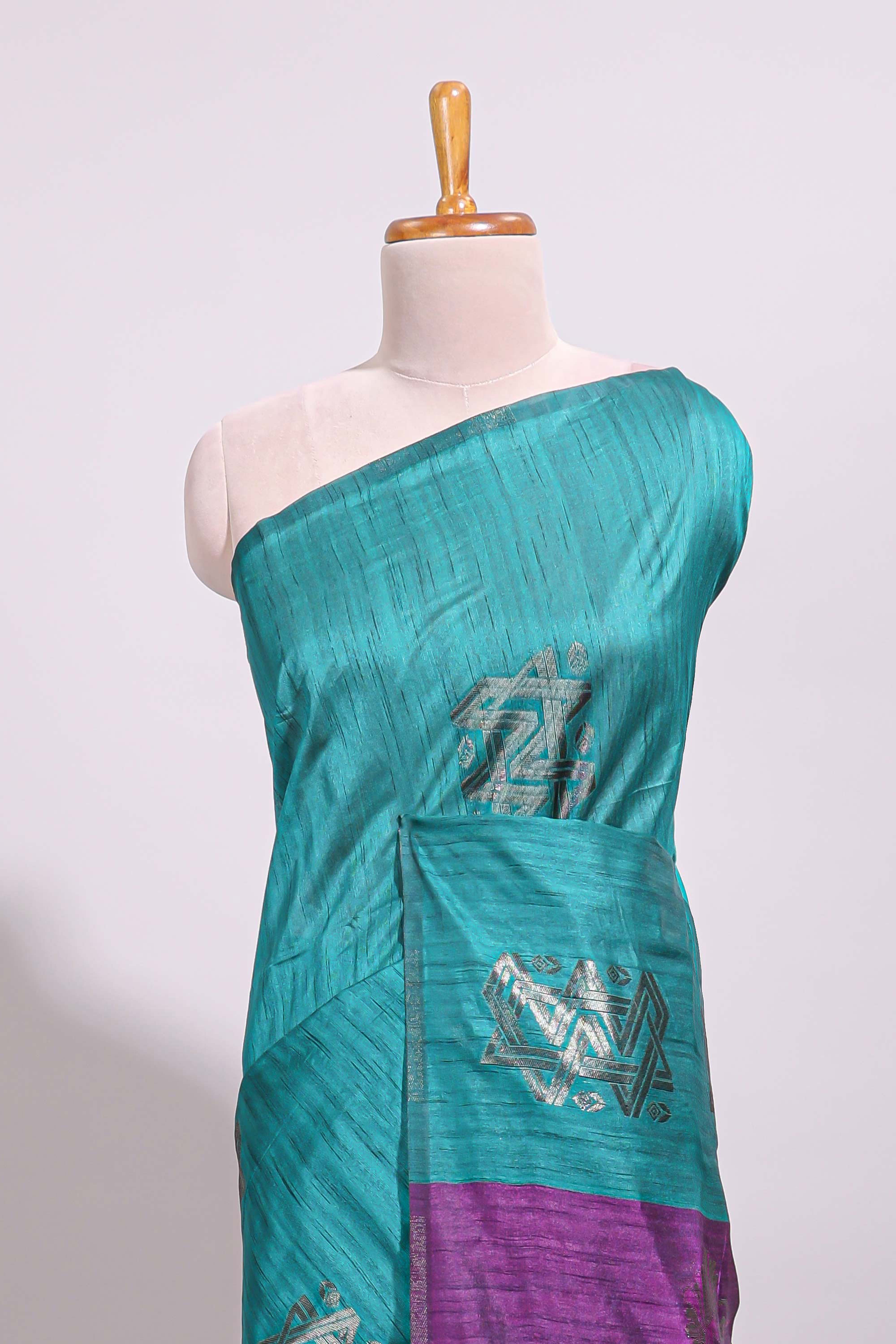 Borderless green checked zari motifs art tussar saree with contrast floral design pallu and zari motifs blouse