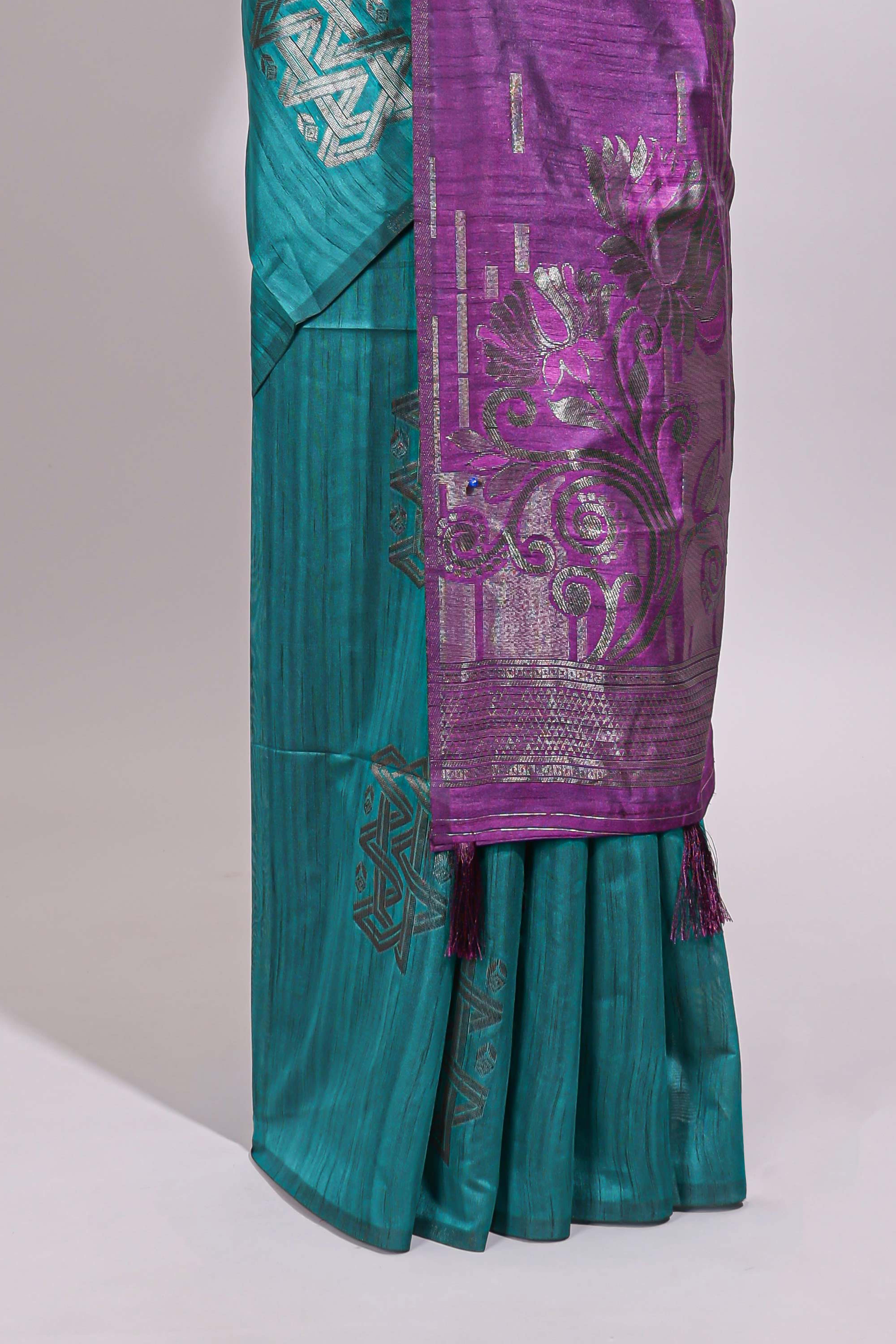 Borderless green textured zari motifs art tussar saree with contrast floral design pallu and zari motifs blouse