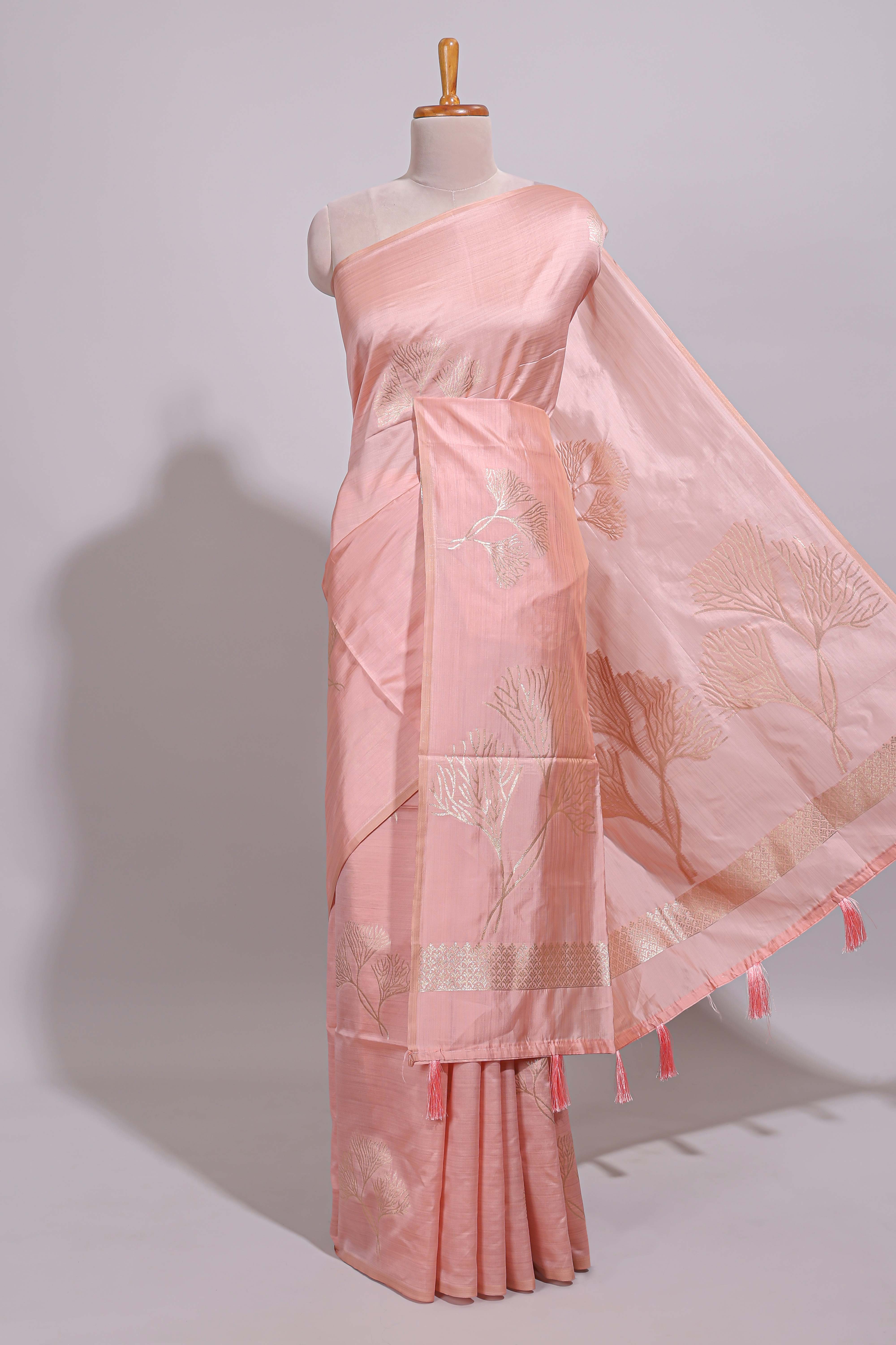Borderless peach floral zari design art tussar saree with self floral design pallu and matching zari motifs blouse