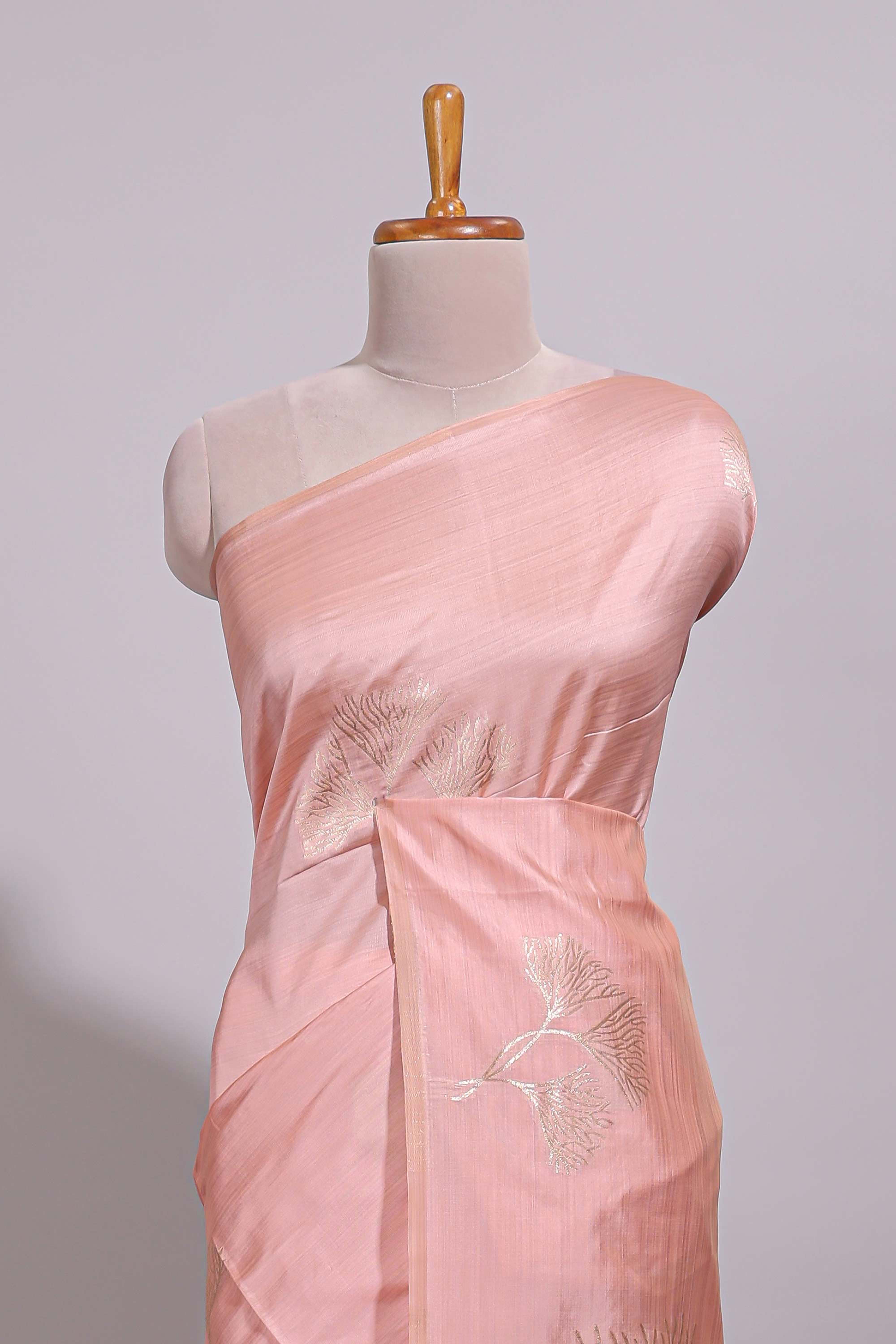 Borderless peach floral zari design art tussar saree with self floral design pallu and matching zari motifs blouse