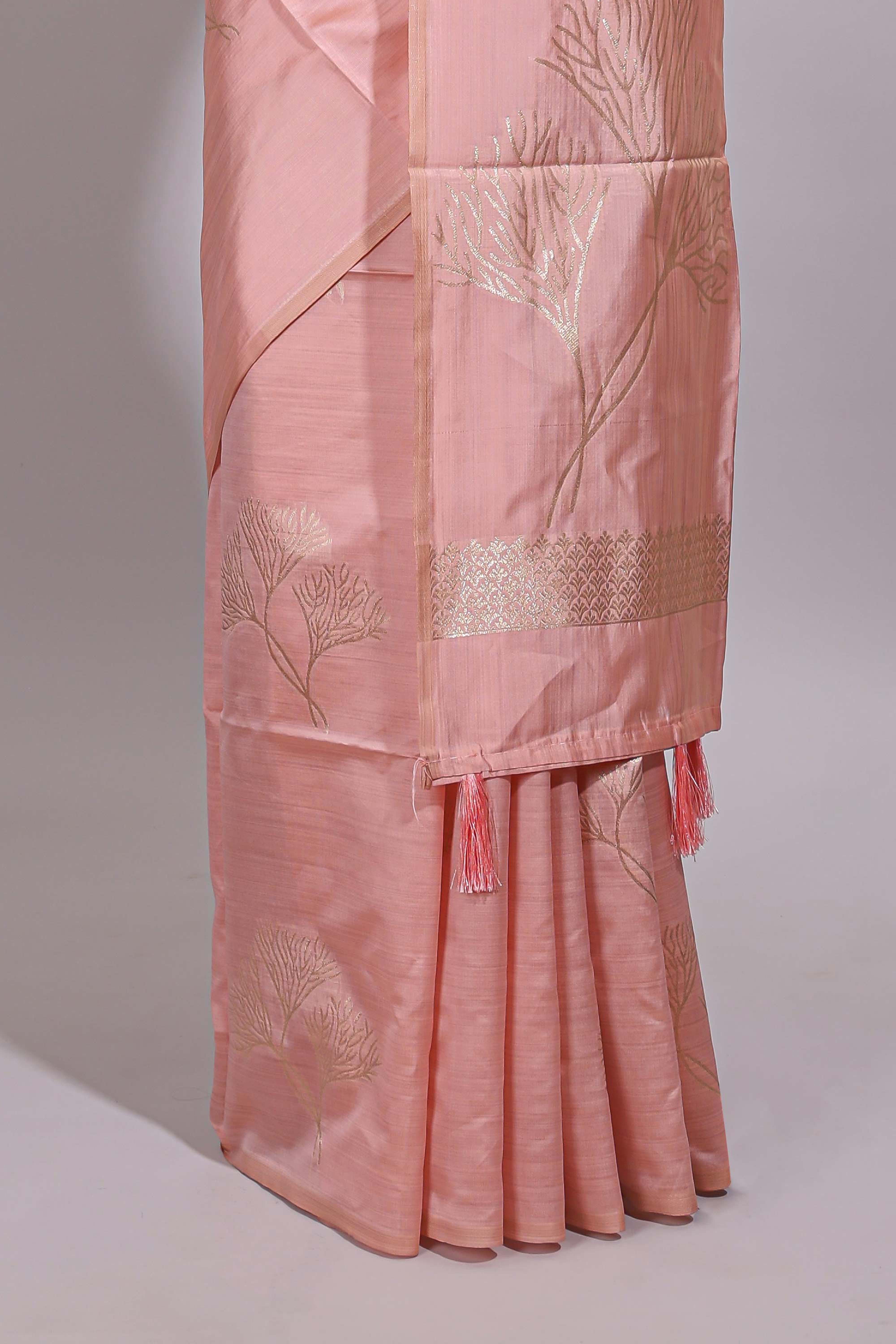 Borderless peach floral zari design art tussar saree with self floral design pallu and matching zari motifs blouse