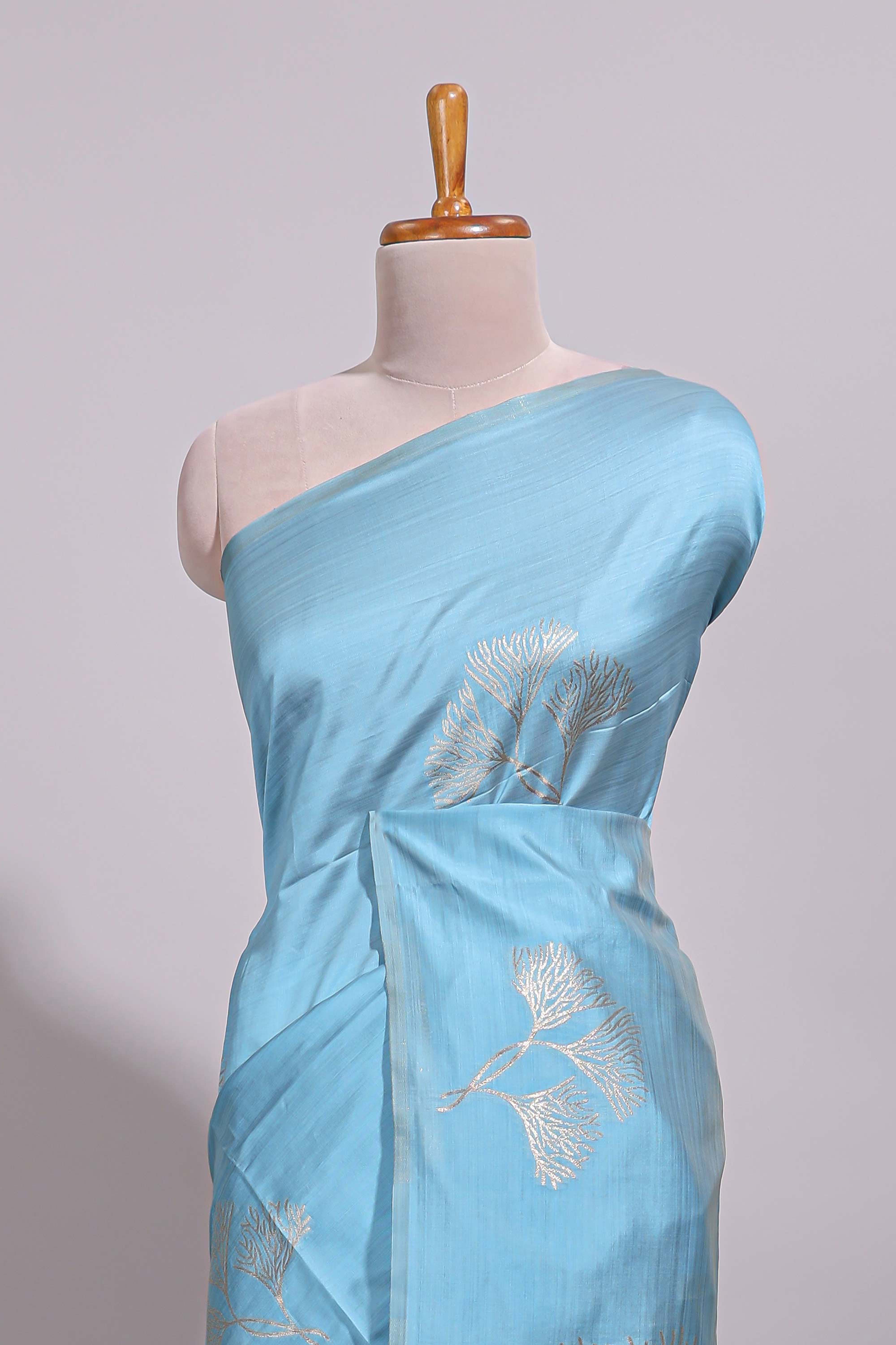 Borderless blue floral zari design art tussar saree with self floral design pallu and matching zari motifs blouse