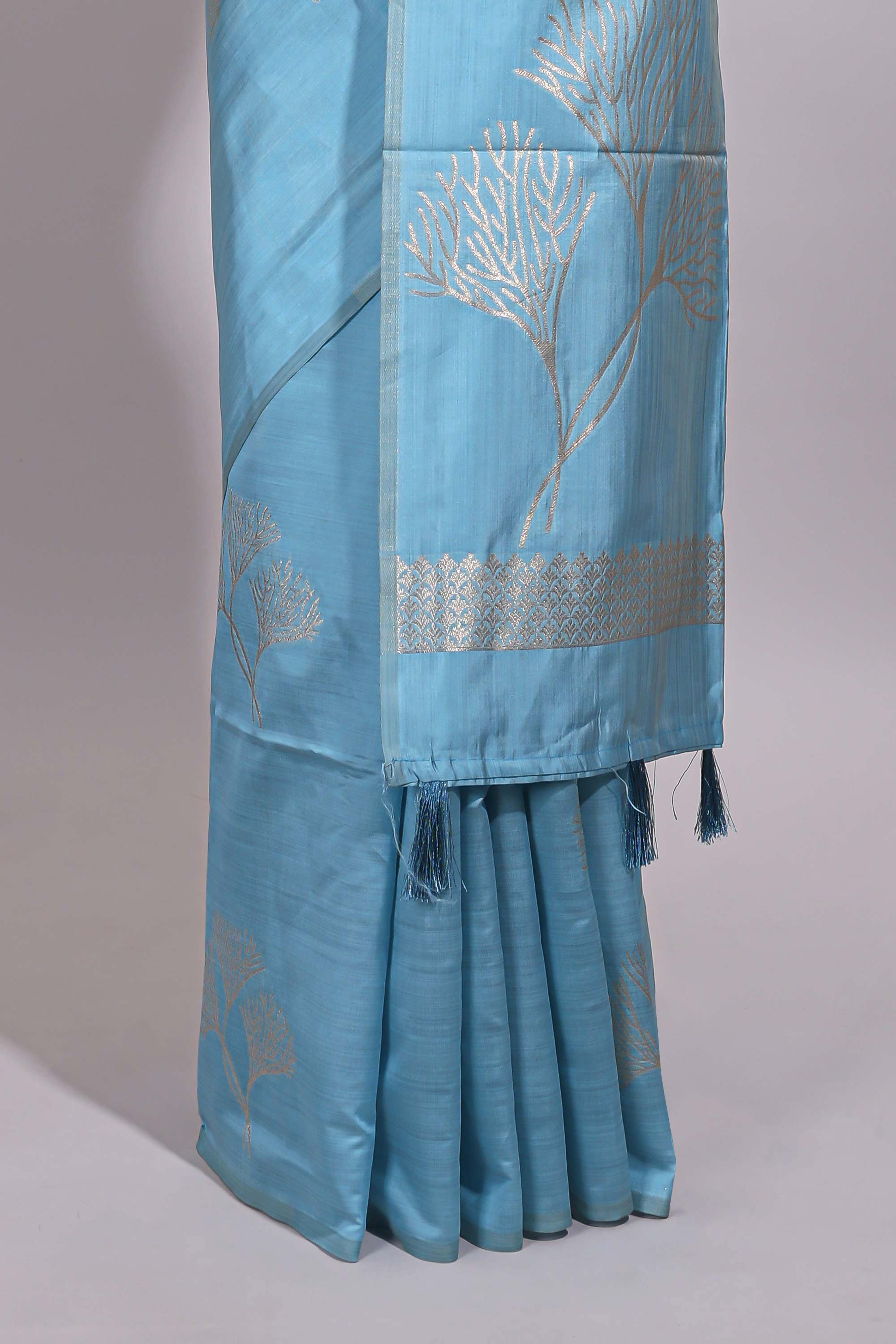 Borderless blue floral zari design art tussar saree with self floral design pallu and matching zari motifs blouse