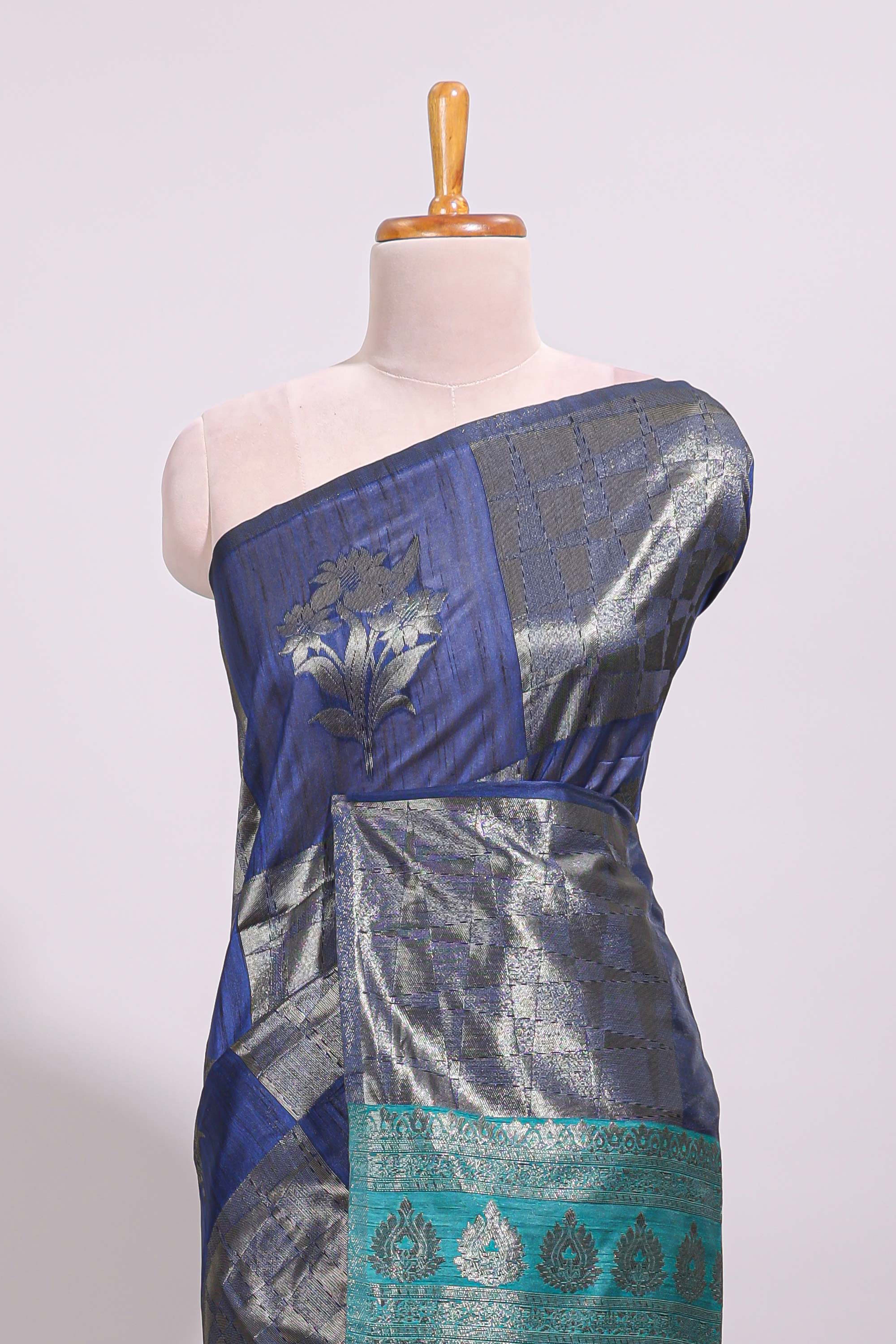 Borderless blue floral zari design art tussar saree with self floral design pallu and matching zari motifs blouse