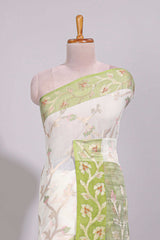White floral design art tussar saree with contrast border and floral vine pallu