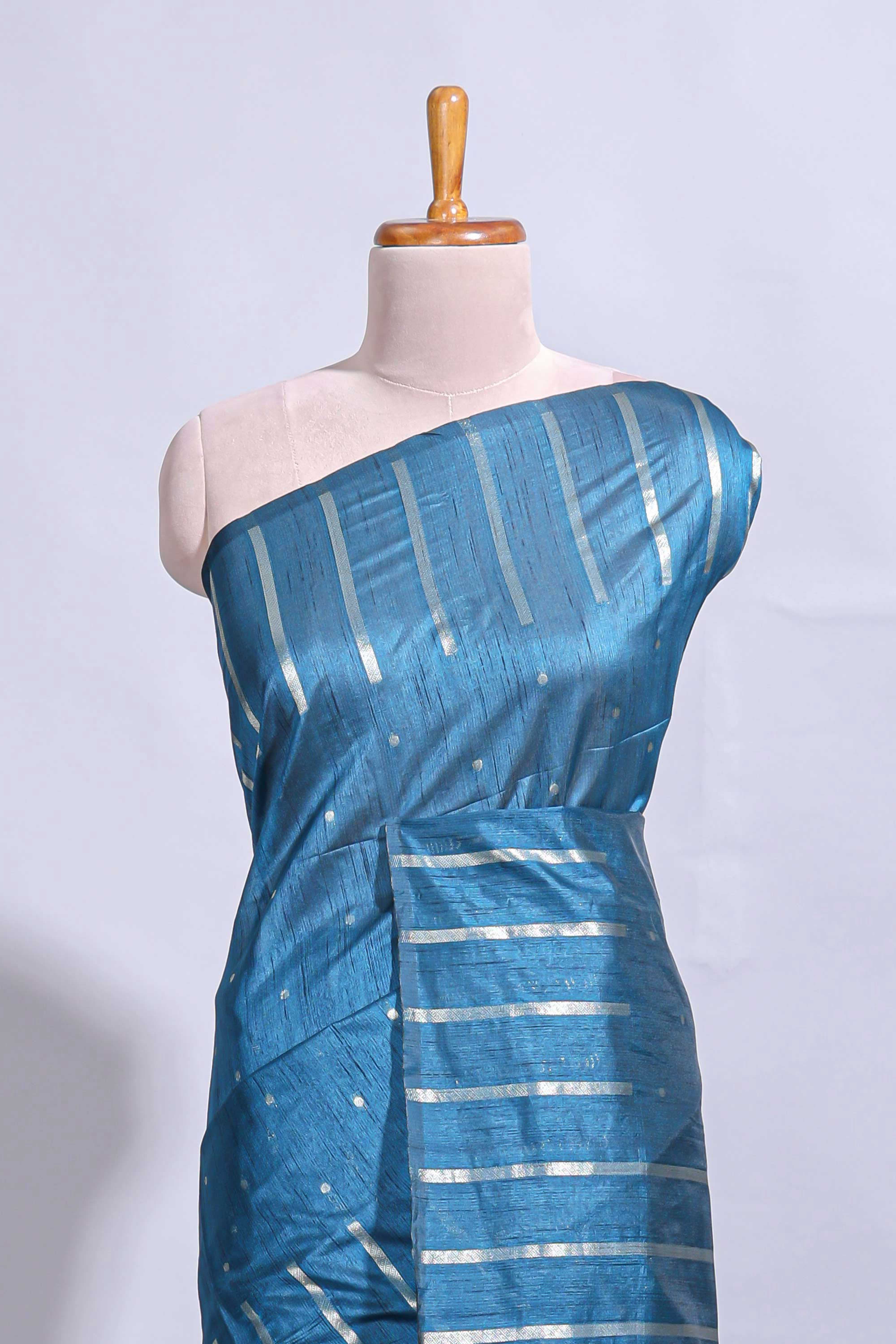 Blue zari butta art tussar saree with self border matching striped blouse