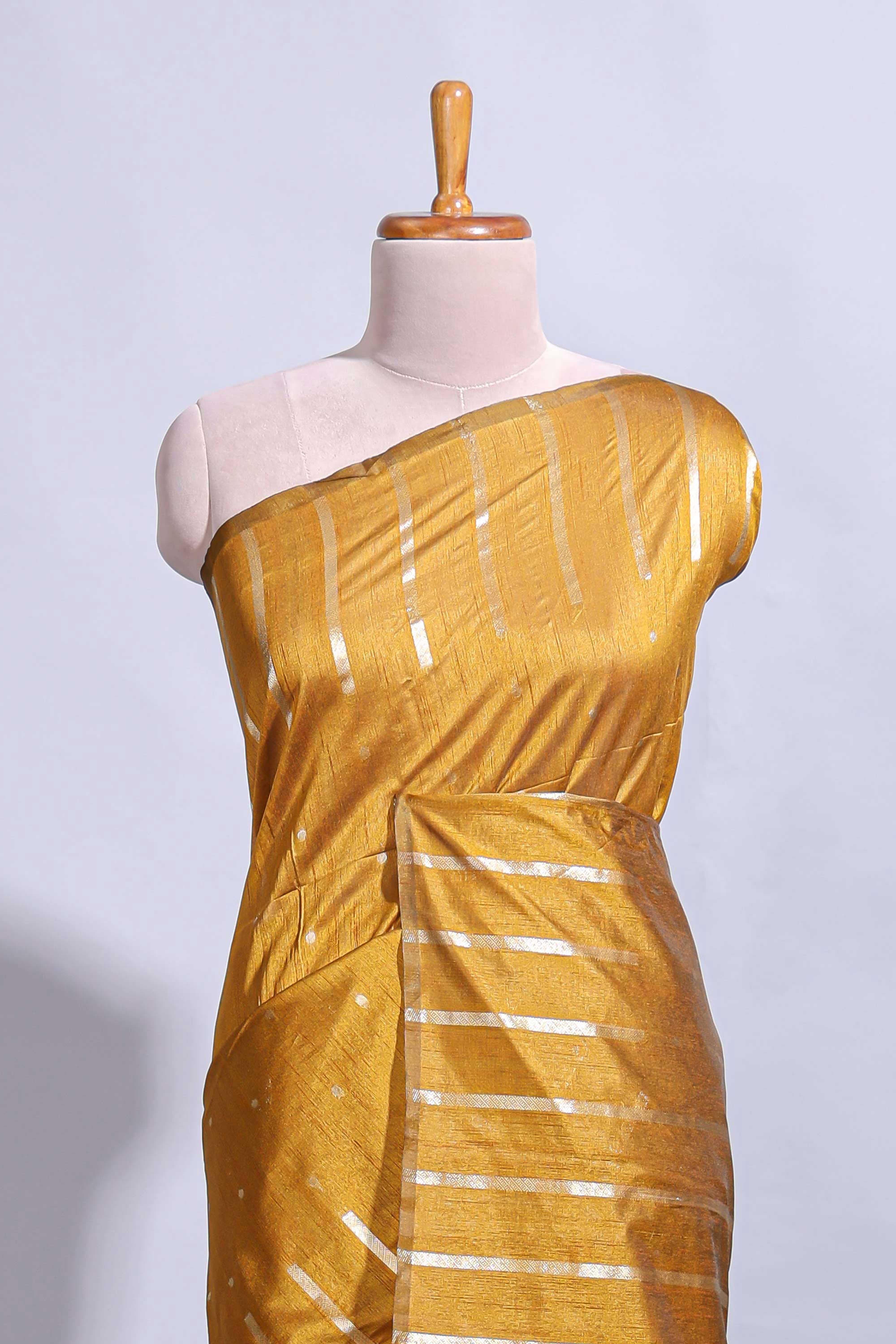 Mustard zari butta art tussar saree with self border matching striped blouse