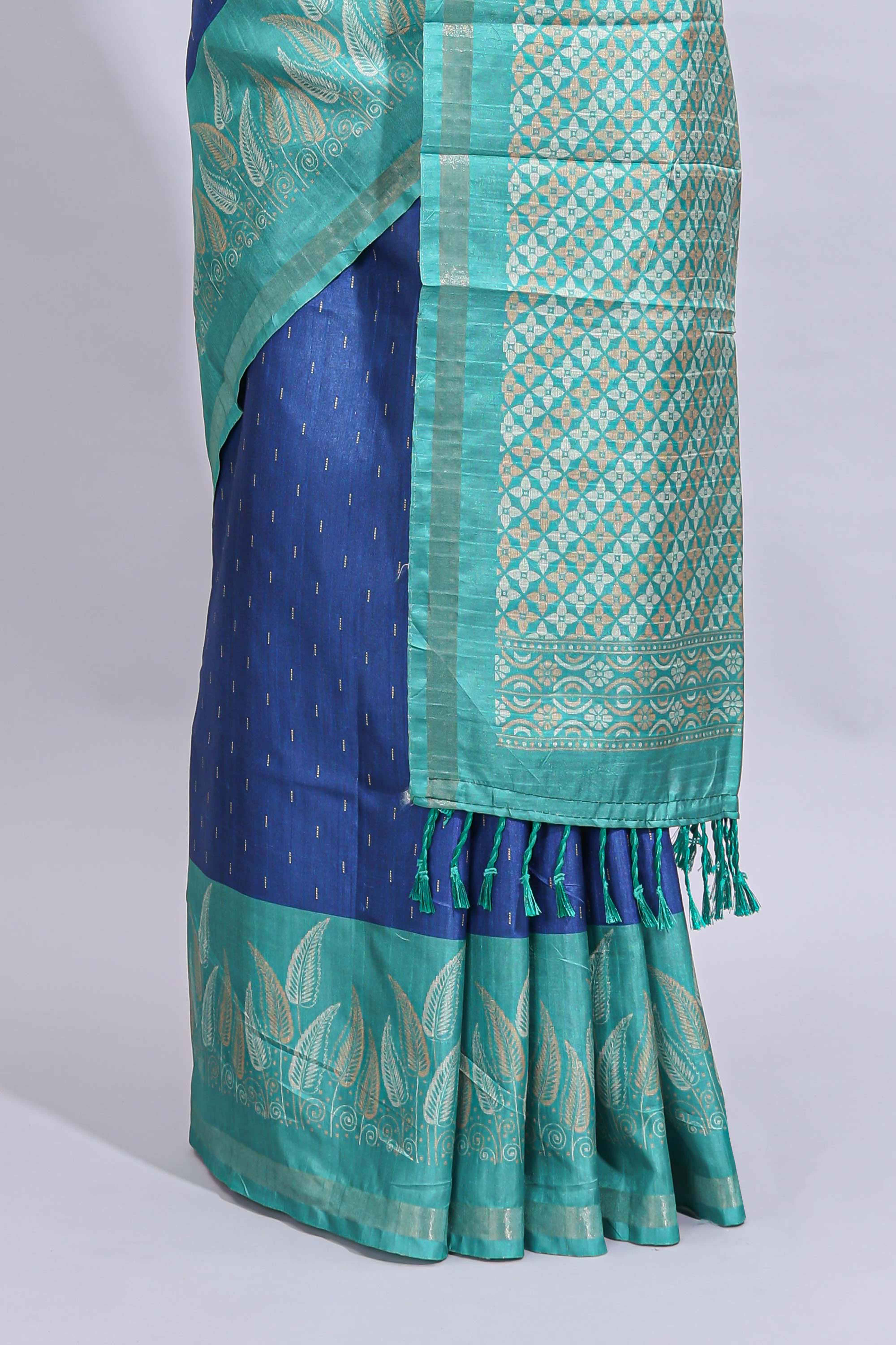 Blue geometric zari butta art tussar saree with contrast zari border and striped blouse