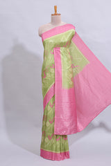 Green geometric design butta art tussar saree with contrast border and plain blouse