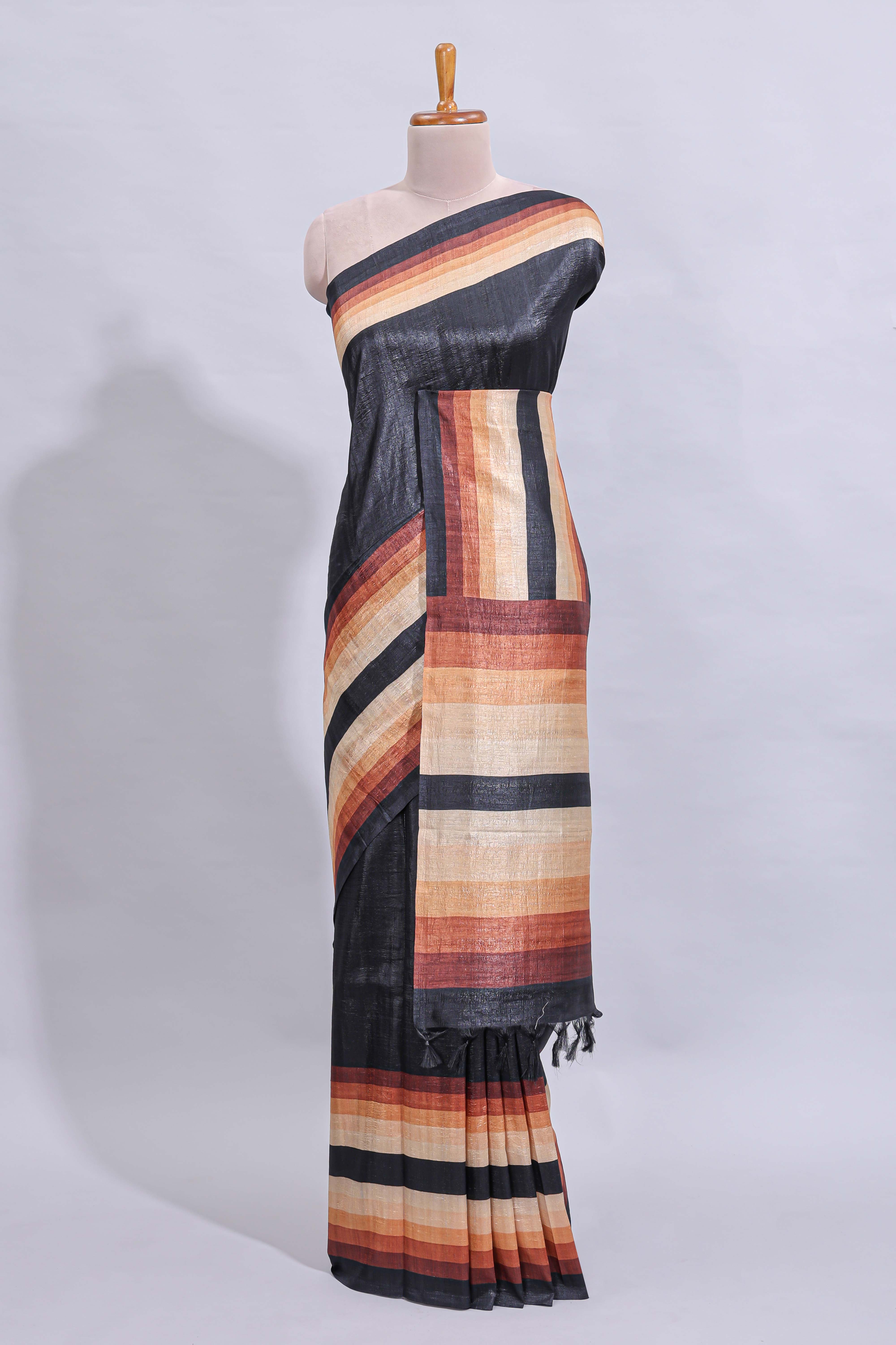Black textured plain art tussar saree with contrast border and matching striped blouse