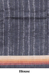 Black textured plain art tussar saree with contrast border and matching striped blouse