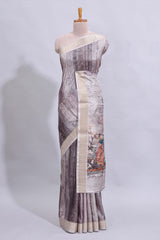 Grey kalamkari style floral design art tussar saree with contrast border and matching striped blouse