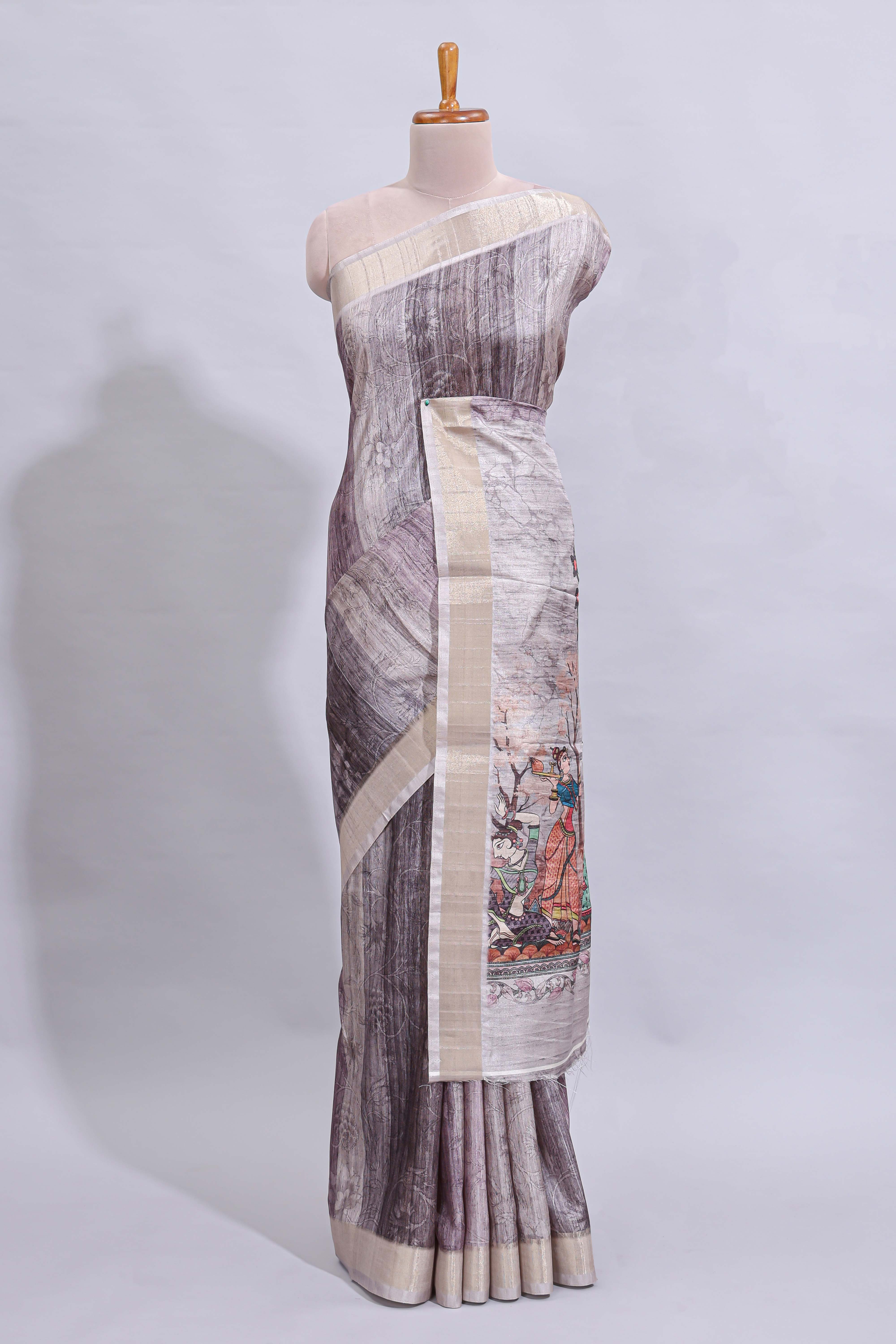 Grey kalamkari style floral design art tussar saree with contrast border and matching striped blouse
