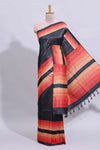 Black textured plain art tussar saree with contrast orange border and matching striped blouse