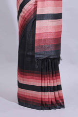Black textured plain art tussar saree with contrast pink border and matching striped blouse