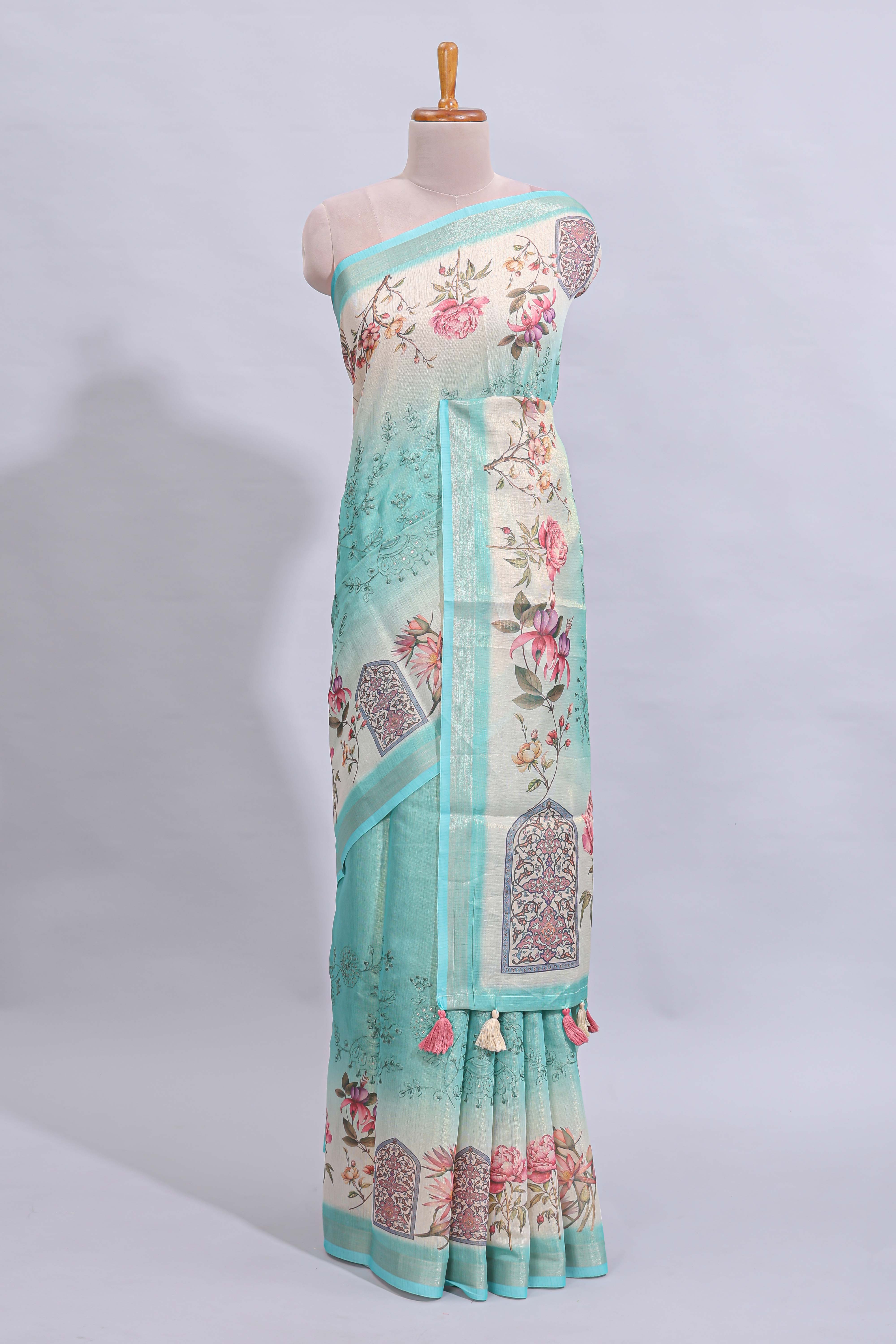 Blue floral design art tussar saree with self zari border and matching printed blouse