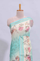 Blue floral design art tussar saree with self zari border and matching printed blouse