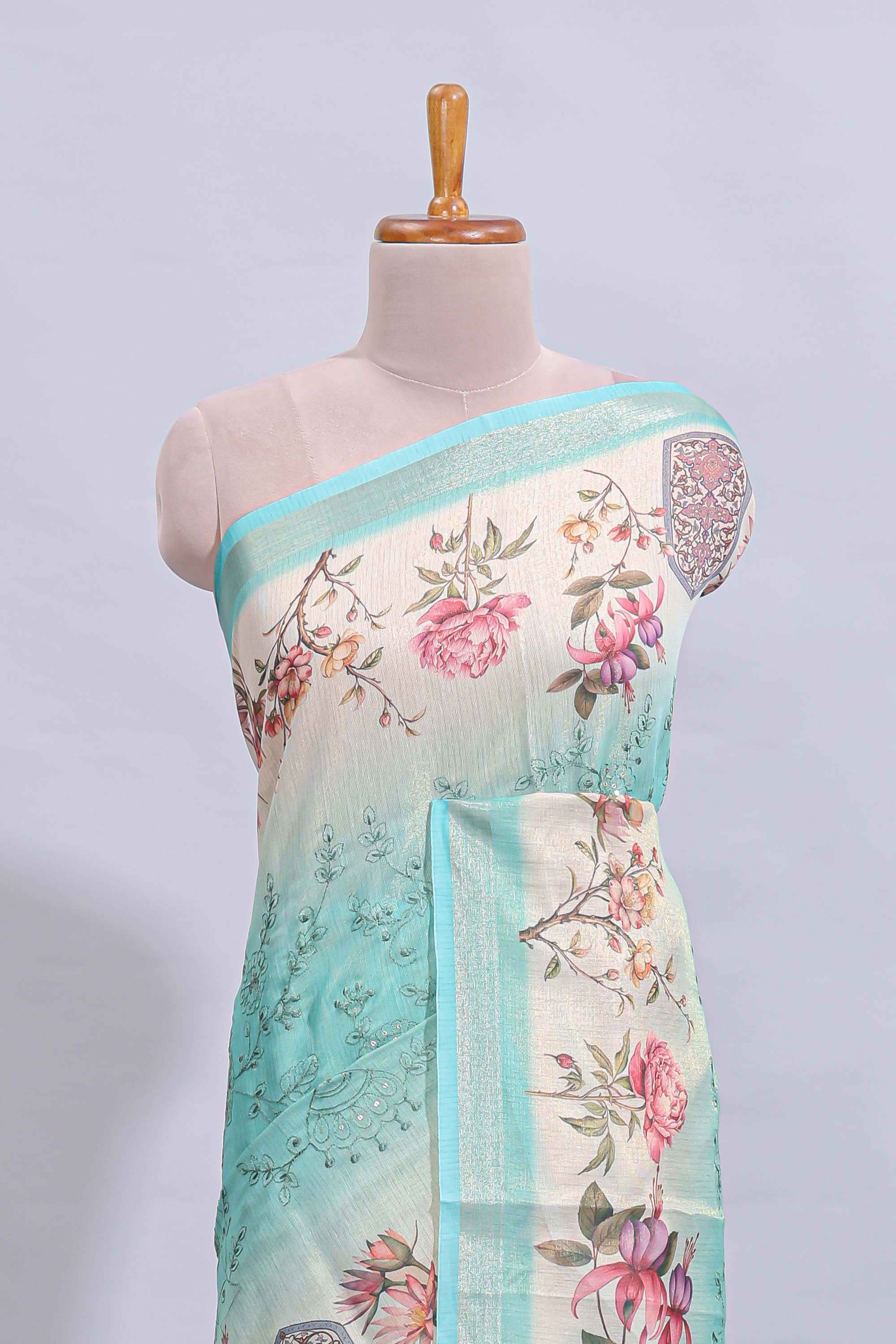 Blue floral design art tussar saree with self zari border and matching printed blouse