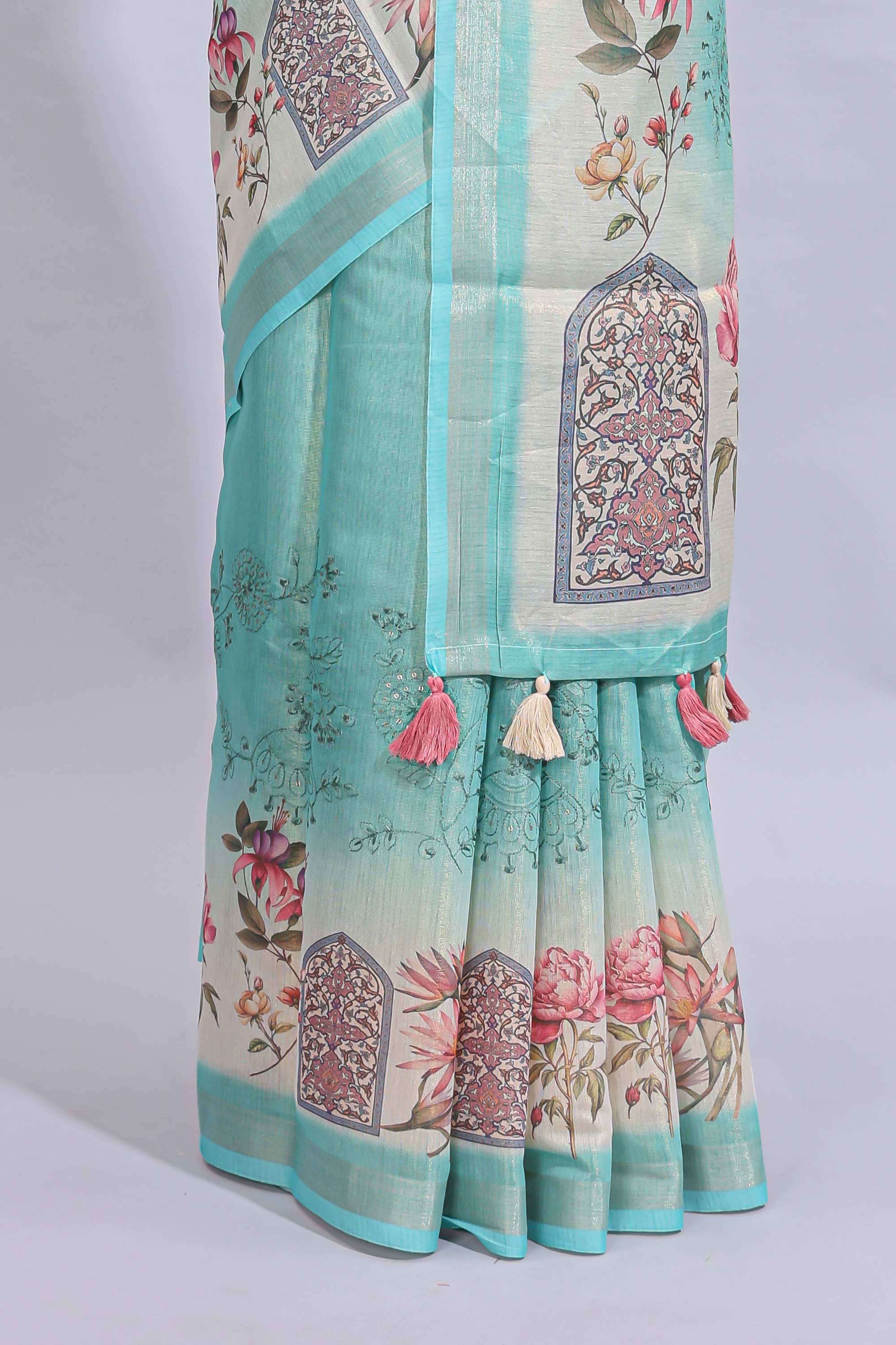 Blue floral design art tussar saree with self zari border and matching printed blouse