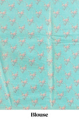 Blue floral design art tussar saree with self zari border and matching printed blouse