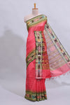 Pink plain art tussar saree with contrast ikkat style border and floral design striped pallu