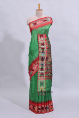 Green plain art tussar saree with contrast ikkat style border and floral design striped pallu