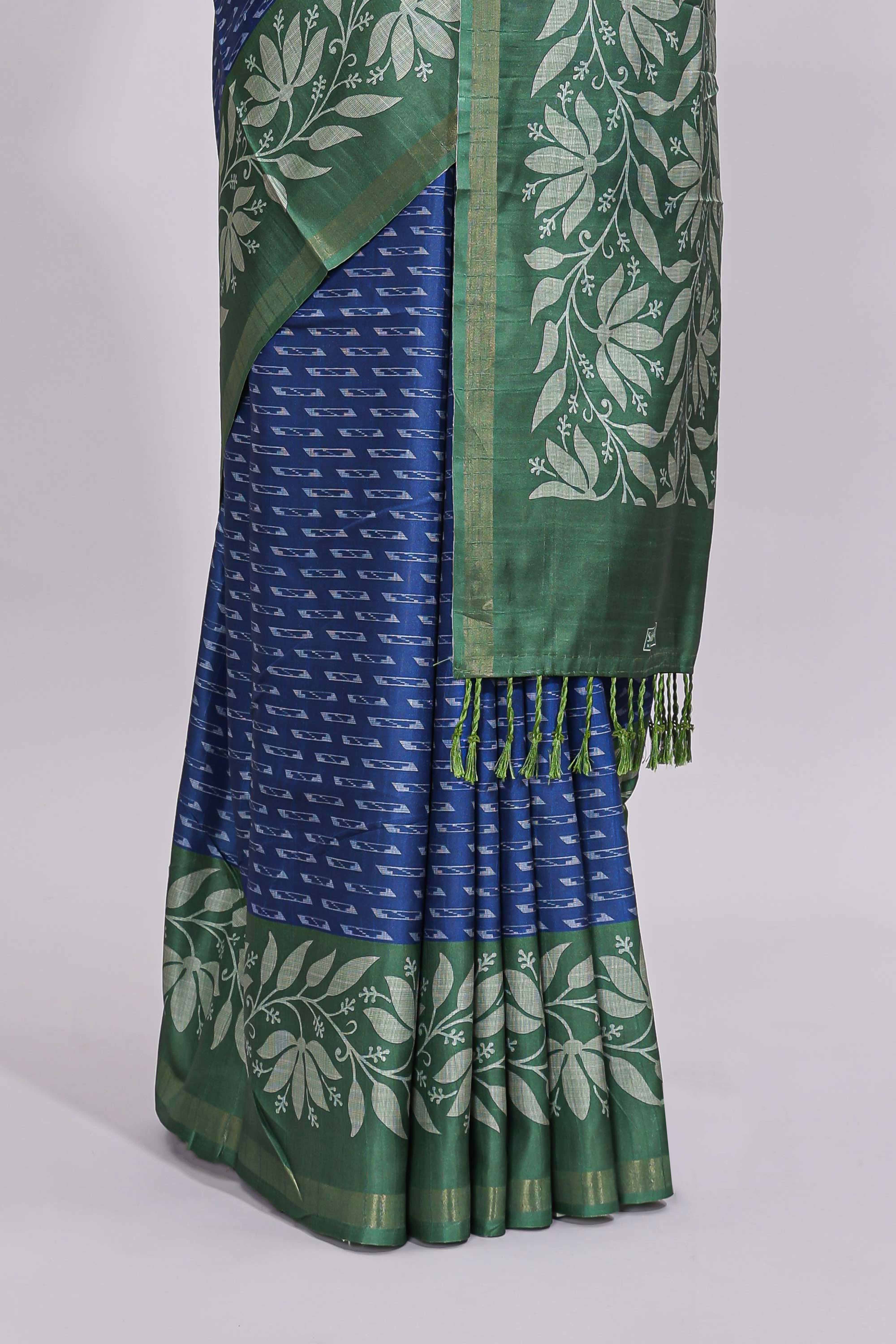 Blue geometric motifs design art tussar saree with contrast floral design border and printed blouse